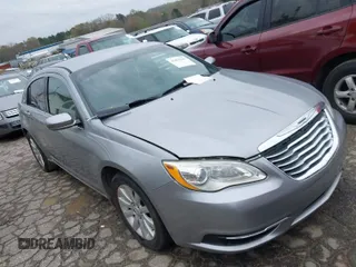 2014 Chrysler 200 Touring with VIN 1C3CCBBB2EN117995, listed as a IAAI auction lot 41862946 with 124,315 mi miles. Bid and sale history available at carsss.com. Image 1.