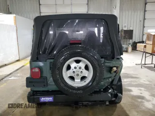 1999 Jeep Wrangler Sport with VIN 1J4FY19S8XP490177, listed as a Copart auction lot 46136045 with 243,883 mi miles and Salvage Title. Bid and sale history available at carsss.com. Image 6.