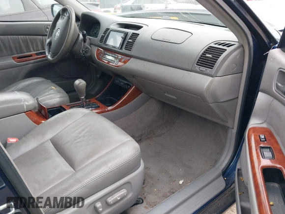 2004 Toyota Camry LE with VIN 4T1BF30K44U069441, listed as a IAAI auction lot 41740124 with 145,906 mi miles. Bid and sale history available at carsss.com. Image 5.