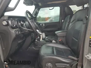 2020 Jeep Wrangler Unlimited Sahara with VIN 1C4HJXEM1LW202755, listed as a Copart auction lot 71248044 with 76,730 mi miles and Salvage Title. Bid and sale history available at carsss.com. Image 7.