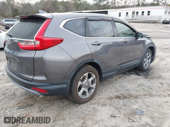 2019 Honda CR-V EX with VIN 7FARW1H57KE037678, listed as a IAAI auction lot 41790923 with 61,754 mi miles and . Bid and sale history available at DreamBid. Image 4.