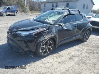 2022 Toyota C-HR XLE z VIN NMTKHMBX5NR141457, wystawiony jako Copart lot #52580545 z przebiegiem 29 345 mil mil oraz Szkody całkowita. Historia ofert i sprzedaży dostępna na DreamBid. Obrazek 1.