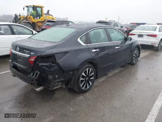 2018 Nissan Altima 2.5 SR with VIN 1N4AL3AP3JC165989, listed as a IAAI auction lot 41490589 with 84,879 mi miles. Bid and sale history available at carsss.com. Image 4.