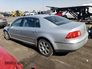2004 Volkswagen Phaeton V8 z VIN WVWAF63D348008461, wystawiony jako Copart lot #75664804 z przebiegiem 207 769 mil mil oraz Szkody całkowita. Historia ofert i sprzedaży dostępna na DreamBid. Obrazek 2.
