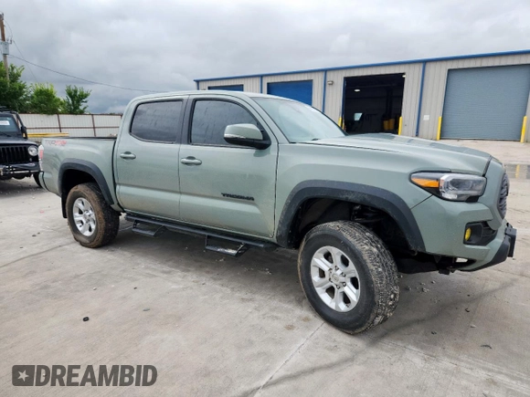 2023 Toyota Tacoma SR with VIN 3TMCZ5AN2PM580515, listed as a Copart auction lot 60422635 with 65,846 mi miles and Salvage title. Bid and sale history available at DreamBid. Image 4.