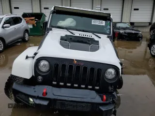 2018 Jeep Wrangler JK Unlimited Rubicon with VIN 1C4BJWFG8JL867448, listed as a Copart auction lot 65513584 with 109,440 mi miles and Salvage Title. Bid and sale history available at carsss.com. Image 5.