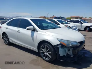 2015 Toyota Camry XLE with VIN 4T1BF1FK4FU477825, listed as a IAAI auction lot 41988429 with 156,886 mi miles and . Bid and sale history available at DreamBid. Image 1.