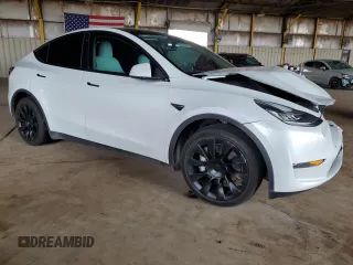 2021 Tesla Model Y Long Range with VIN 5YJYGDEE6MF075819, listed as a Copart auction lot 50903425 with 67,857 mi miles and Salvage Title. Bid and sale history available at DreamBid. Image 4.
