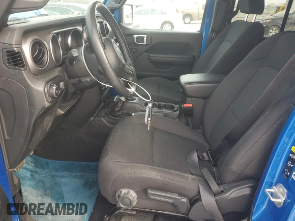 2023 Jeep Wrangler Sport S with VIN 1C4HJXDN5PW573692, listed as a Copart auction lot 42982875 with 25,584 mi miles and Salvage Title. Bid and sale history available at DreamBid. Image 7.
