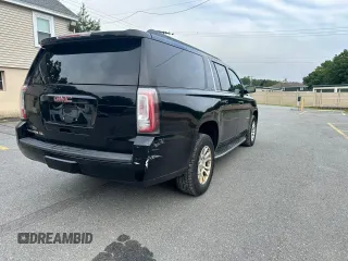 2016 GMC Yukon XL SLT with VIN 1GKS2GKC2GR180580, listed as a Copart auction lot 66899234 with 243,232 mi miles and Clean Title. Bid and sale history available at carsss.com. Image 3.