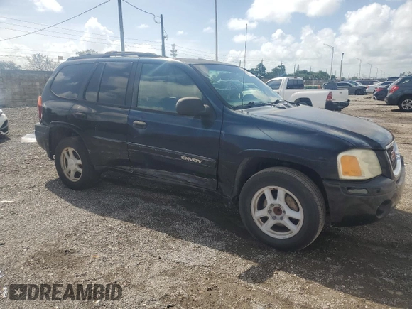 2004 GMC Envoy SLE with VIN 1GKDS13S942114009, listed as a Copart auction lot 67276454 with 178,107 mi miles and Salvage Title. Bid and sale history available at DreamBid. Image 4.