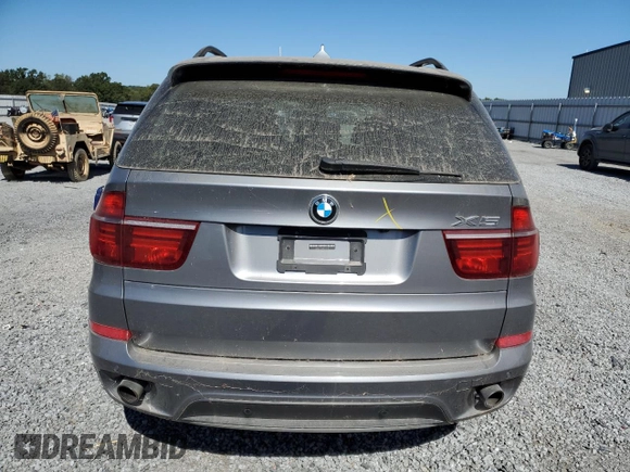 2011 BMW X5 35i z VIN 5UXZV4C50BL743135, wystawiony jako Copart lot #75401064 z przebiegiem 100 446 mil mil oraz Szkoda całkowita • Salvage title. Historia ofert i sprzedaży dostępna na DreamBid. Obrazek 6.