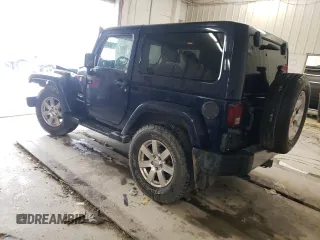 2013 Jeep Wrangler Sahara z VIN 1C4AJWBG4DL504800, wystawiony jako Copart lot #60504575 z przebiegiem 166 687 mil mil oraz Szkoda całkowita • Salvage title. Historia ofert i sprzedaży dostępna na DreamBid. Obrazek 2.