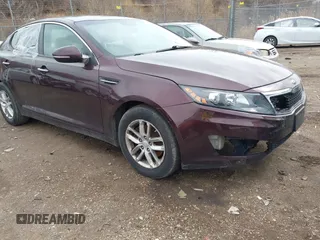 2013 Kia Optima LX with VIN 5XXGM4A70DG091393, listed as a IAAI auction lot 41823880 with 170,966 mi miles. Bid and sale history available at carsss.com. Image 1.
