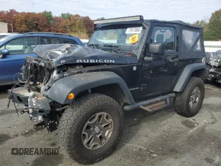 2014 Jeep Wrangler Rubicon with VIN 1C4BJWCG1EL134460, listed as a Copart auction lot 77917004 with 113,842 mi miles and Salvage title. Bid and sale history available at DreamBid. Image 1.