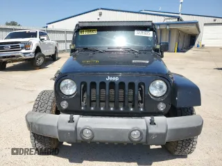 2016 Jeep Wrangler Unlimited Rubicon with VIN 1C4BJWFG5GL290757, listed as a Copart auction lot 52099225 with 102,424 mi miles and Salvage title. Bid and sale history available at DreamBid. Image 5.