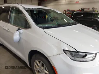 2022 Chrysler Pacifica Touring L with VIN 2C4RC1BGXNR144831, listed as a IAAI auction lot 40473026 with 36,495 mi miles and . Bid and sale history available at DreamBid. Image 6.