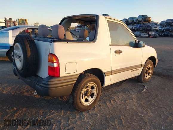 2000 Chevrolet Tracker z VIN 2CNBE18C3Y6920718, wystawiony jako IAAI lot #41566833 z przebiegiem 157 316 mil mil oraz . Historia ofert i sprzedaży dostępna na DreamBid. Obrazek 4.