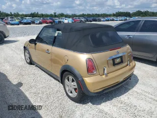 2005 MINI Convertible with VIN WMWRF334X5TG11889, listed as a Copart auction lot 55567995 with 169,717 mi miles and Salvage title. Bid and sale history available at DreamBid. Image 2.