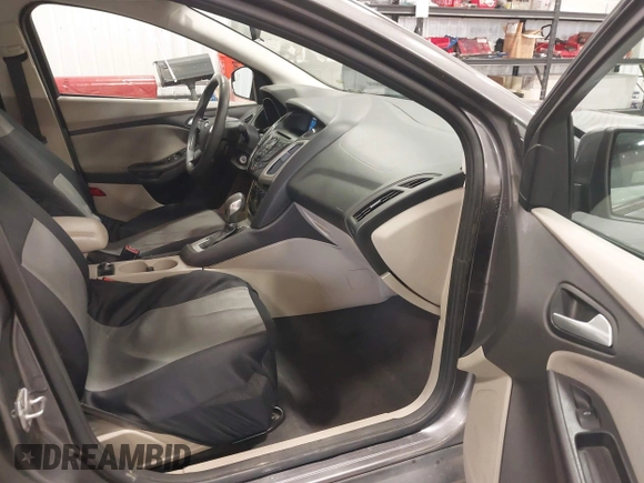 2013 Ford Focus SE with VIN 1FADP3F26DL359581, listed as a IAAI auction lot 42129909 with 129,832 mi miles. Bid and sale history available at carsss.com. Image 5.