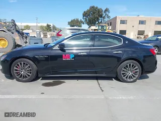 2019 Maserati Ghibli with VIN ZAM57XSA5K1328183, listed as a IAAI auction lot 41970101 with 61,260 mi miles. Bid and sale history available at carsss.com. Image 14.