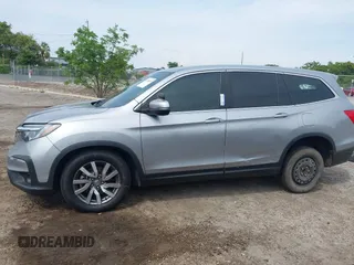 2021 Honda Pilot EX z VIN 5FNYF5H3XMB030112, wystawiony jako IAAI lot #42204148 z przebiegiem 96 182 mil mil oraz . Historia ofert i sprzedaży dostępna na DreamBid. Obrazek 15.