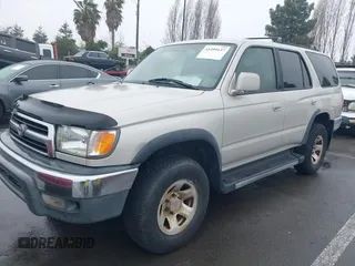 1999 Toyota 4Runner SR5 with VIN JT3GN86R2X0103701, listed as a IAAI auction lot 41499137 with 302,834 mi miles. Bid and sale history available at carsss.com. Image 2.