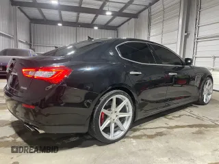 2014 Maserati Ghibli S Q4 z VIN ZAM57RTA9E1112724, wystawiony jako Copart lot #73739204 z przebiegiem 45 525 mil mil oraz Szkoda całkowita • Salvage title. Historia ofert i sprzedaży dostępna na DreamBid. Obrazek 4.