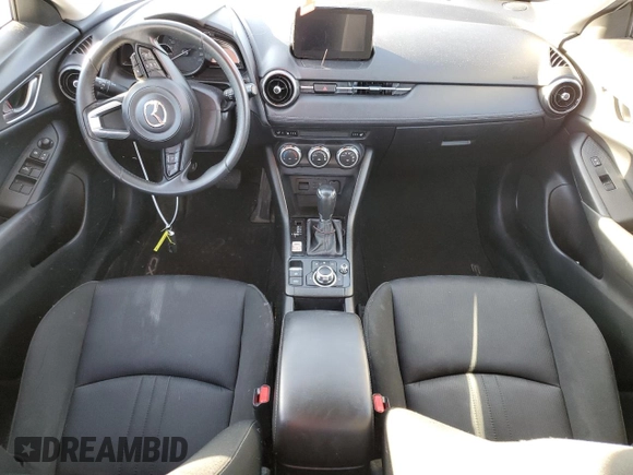 2020 Mazda CX-3 GS z VIN JM1DKFC79L1472123, wystawiony jako Copart lot #73379514 z przebiegiem 85 815 mil mil oraz Szkoda całkowita • Salvage title. Historia ofert i sprzedaży dostępna na DreamBid. Obrazek 8.