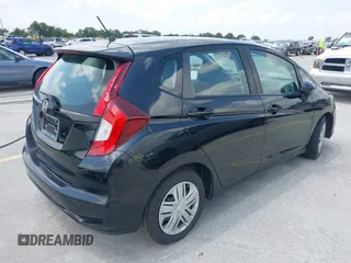 2020 Honda Fit LX z VIN 3HGGK5H45LM733449, wystawiony jako IAAI lot #42388666 z przebiegiem 28 064 mil mil oraz . Historia ofert i sprzedaży dostępna na DreamBid. Obrazek 4.