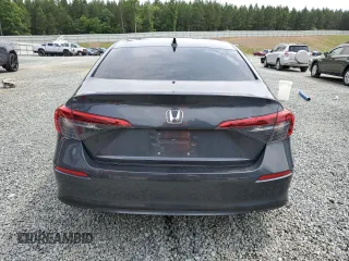 2024 Honda Civic Touring z VIN 2HGFE1F96RH324748, wystawiony jako Copart lot #58833725 z przebiegiem Nie podano mil oraz Szkoda całkowita • Salvage title. Historia ofert i sprzedaży dostępna na DreamBid. Obrazek 6.