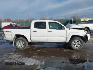 2014 Toyota Tacoma with VIN 3TMLU4ENXEM134872, listed as a IAAI auction lot 41303669 with 167,548 mi miles. Bid and sale history available at carsss.com. Image 14.