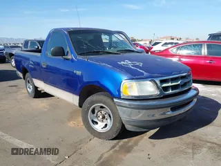 1997 Ford F-150 with VIN 1FTDF1722VKB97679, listed as a IAAI auction lot 41883923 with 211,640 mi miles and . Bid and sale history available at DreamBid. Image 1.