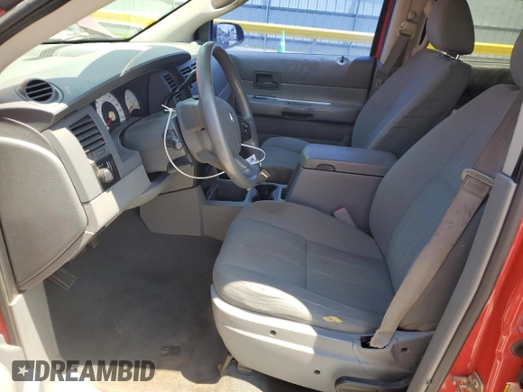 2005 Dodge Durango SXT with VIN 1D4HB38N65F614038, listed as a Copart auction lot 63580585 with 301,673 mi miles and Salvage title. Bid and sale history available at DreamBid. Image 7.