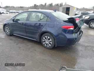 2021 Toyota Corolla Hybrid LE with VIN JTDEAMDE2MJ030035, listed as a IAAI auction lot 41644662 with 130,693 mi miles. Bid and sale history available at carsss.com. Image 3.