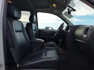 2008 GMC Envoy Denali with VIN 1GKET63M382216072, listed as a IAAI auction lot 41618044 with 148,598 mi miles. Bid and sale history available at carsss.com. Image 5.