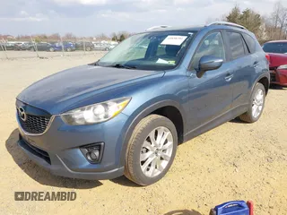 2015 Mazda CX-5 Grand Touring with VIN JM3KE4DY5F0469098, listed as a IAAI auction lot 41858792 with 174,883 mi miles. Bid and sale history available at carsss.com. Image 18.
