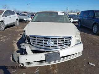 2008 Cadillac DTS 1SD z VIN 1G6KD57YX8U146211, wystawiony jako IAAI lot #41416406 z przebiegiem 141 362 mil mil oraz . Historia ofert i sprzedaży dostępna na DreamBid. Obrazek 6.