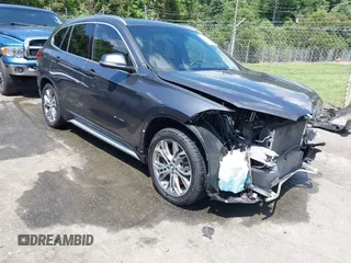 2017 BMW X1 xDrive28i with VIN WBXHT3Z38H4A55086, listed as a IAAI auction lot 42459276 with 101,907 mi miles and . Bid and sale history available at DreamBid. Image 17.