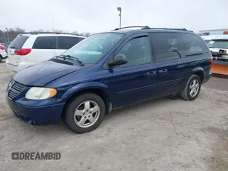 2005 Dodge Caravan SXT with VIN 2D4GP44L75R114843, listed as a IAAI auction lot 41644975 with 128,767 mi miles and . Bid and sale history available at DreamBid. Image 2.
