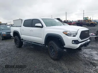 2016 Toyota Tacoma SR5 z VIN 3TMAZ5CN2GM010468, wystawiony jako IAAI lot #40930905 z przebiegiem 107 994 mil mil oraz . Historia ofert i sprzedaży dostępna na DreamBid. Obrazek 1.