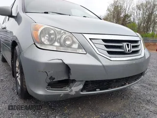 2009 Honda Odyssey EX-L with VIN 5FNRL387X9B043289, listed as a IAAI auction lot 41951208 with 197,184 mi miles and . Bid and sale history available at DreamBid. Image 12.