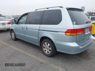 2003 Honda Odyssey EX-L with VIN 5FNRL18943B138444, listed as a IAAI auction lot 41498605 with 153,947 mi miles and . Bid and sale history available at DreamBid. Image 3.