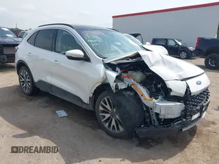 2020 Ford Escape Titanium Hybrid with VIN 1FMCU0DZ9LUA54867, listed as a IAAI auction lot 42268245 with 68,974 mi miles and . Bid and sale history available at DreamBid. Image 1.