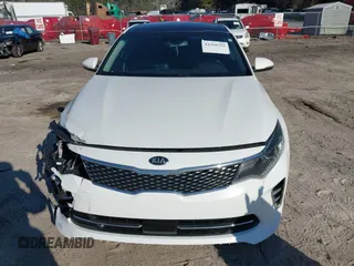 2016 Kia Optima SX Turbo with VIN 5XXGW4L2XGG084628, listed as a IAAI auction lot 41668592 with 116,535 mi miles and . Bid and sale history available at carsss.com. Image 12.