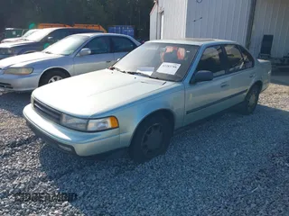 1989 Nissan Maxima z VIN JN1HJ01P5KT267358, wystawiony jako IAAI lot #42283788 z przebiegiem 152 298 mil mil oraz . Historia ofert i sprzedaży dostępna na DreamBid. Obrazek 2.