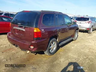 2007 GMC Envoy SLE with VIN 1GKDS13S472201367, listed as a IAAI auction lot 41327646 with 232,019 mi miles. Bid and sale history available at carsss.com. Image 4.