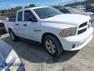 2014 Ram 1500 Tradesman z VIN 1C6RR7FT5ES115493, wystawiony jako IAAI lot #41680465 z przebiegiem 90 852 mil mil oraz . Historia ofert i sprzedaży dostępna na DreamBid. Obrazek 1.