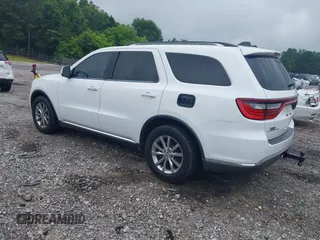 2016 Dodge Durango SXT with VIN 1C4RDHAG2GC330995, listed as a IAAI auction lot 42410612 with 118,412 mi miles and . Bid and sale history available at DreamBid. Image 3.