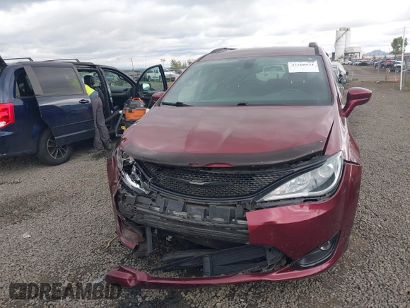 2020 Chrysler Pacifica Touring with VIN 2C4RC1FG6LR142887, listed as a IAAI auction lot 42260931 with 50,008 mi miles and . Bid and sale history available at DreamBid. Image 12.